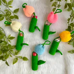 My tulip lipstick holders in action. They are designed to hold a standard lipstick or lip balm, keeping it safe and easy to find in your bag.