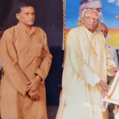 Standing beside Guruji during an event. Being his disciple meant observing, listening, and practicing with unwavering dedication. What I teach in my online classes is a continuation of his life's work.