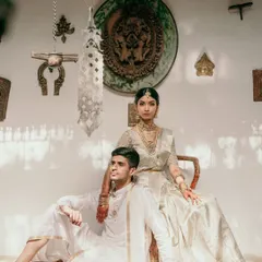 Elegance in simplicity. For this daytime wedding, we worked with the couple to create a timeless look, pairing their classic ivory outfits with the venue's natural heritage charm. This is how we turn moments into classic portraits.