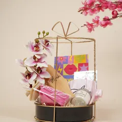 A full view of the stunning birthday hamper for her, decorated with orchids. It's designed to be a showstopper gift for a special someone.