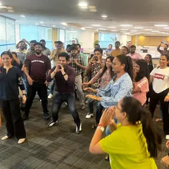 This is what pure joy in the middle of a workday looks like. I guide your team through fun, simple Zumba routines right in the office, breaking the monotony and boosting team morale.
