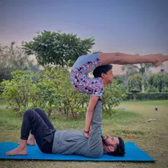 This Purna Shalabhasana (Full Locust Pose) variation in acro yoga is an amazing backbend for the flyer and a great strength builder for the base. I always say, if you want to lift yourself up, lift someone else.