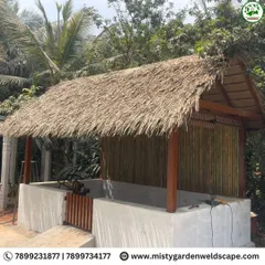 Another view of the cow shed, showing its sturdy construction and natural materials. It provides a comfortable and hygienic space for livestock while blending into the farm environment.