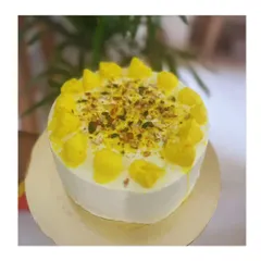 My Rasamalai Cake is your new obsession. It combines the beloved Indian sweet with a modern cake structure, topped with nuts and saffron-infused cream.
