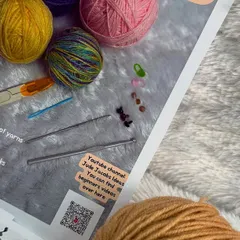 This photo shows a close-up of the kit's packaging insert, which lists all the included contents. You can also see the QR code that links directly to my 'Jude Jacobs Ideas' YouTube channel for detailed beginner videos.