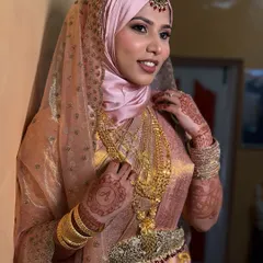 A smiling portrait of the Nikkah bride. Her happiness and confidence shine through, making the look even more beautiful.