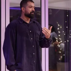 A candid moment of me speaking. This reflects the connection between my dance journey and my personal growth.