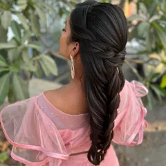 A stunning and intricate mermaid braid. This advanced hairstyle is perfect for a reception or engagement, creating a unique and unforgettable look.