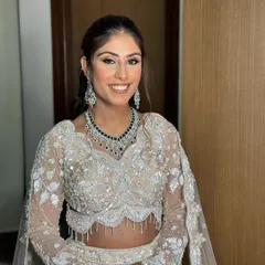 A happy and glowing bride, ready for her sangeet night. My goal is always to make you feel like the best version of yourself.