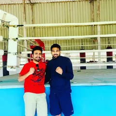 In the boxing ring with my friend, Olympian Manoj Kumar. There is mutual respect and a lot to learn between athletes from different sports.