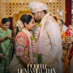 A moment of blessing and love during the wedding ceremony. The groom's tender kiss on his bride's forehead, surrounded by the warmth of the rituals, makes for an unforgettable memory.