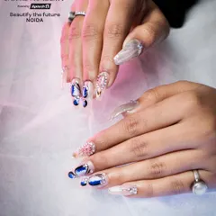 This shot showcases a full set of butterfly-themed nails, demonstrating the ability to create a cohesive and artistic design across all ten fingers.