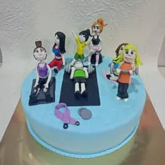 A fun cake for a group of fitness freaks! This design shows a whole gym scene with people lifting weights and working out, all handcrafted from fondant.
