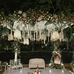 This elegant mandap is a fusion of contemporary and traditional design. We used a canopy of pastel florals and intricate hanging arrangements to create a dreamy, romantic space for the wedding ceremony.
