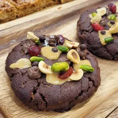 My Dark Chocolate Overload Cookies are not for the faint of heart. They are loaded with pistachios, hazelnuts, cranberries, and drizzled with more chocolate and peanut butter.