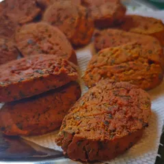 Kothimbir Wadi, or coriander fritters. My secret is using a 70:30 ratio of coriander to besan (chickpea flour), so you can really taste the fresh herbs. It's a soul-pleasing snack, perfect for any time of day.