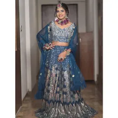 I love how this client styled the blue and silver lehenga with floral jewellery. It shows how you can personalize any of my rental outfits to fit your unique style.