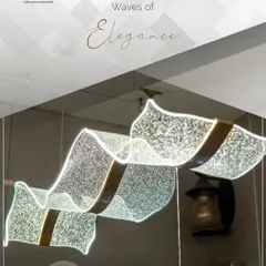 This is more than just a light; it's a flowing sculpture for your ceiling. I select pieces like this 'Waves of Elegance' chandelier to serve as the central artwork for a room, perfect for dining areas or entryways.
