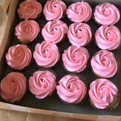 Pretty in pink. These cupcakes with delicate pink rose frosting are a beautiful addition to a baby girl's shower, a bridal shower, or a princess-themed party.