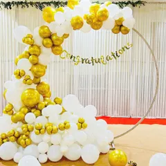 This elegant ring backdrop is perfect for milestone celebrations like retirements, anniversaries, or promotions. The circular frame is decorated with a lush arrangement of white and gold balloons and a 'Congratulations' banner.