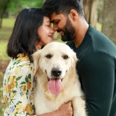 A maternity shoot filled with so much love, fun, and of course, treats. This intimate outdoor portrait captures the tender connection between the couple and their gorgeous Golden Retriever.