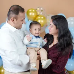 The love and adoration in their eyes says it all. I focus on capturing the natural interactions between family members.