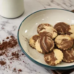 A perfect blend of taste and beauty. My marble cookies combine vanilla and chocolate dough to create a visually stunning and delicious treat that's a feast for the senses.