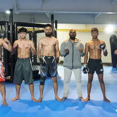 A group of our warriors with me after a hard training session. This team is built on mutual respect and a shared goal of being the best.