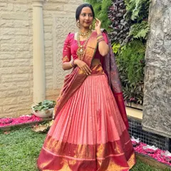 Here you can see the full silhouette of the transformed Kanchi saree lehenga. Paired with a matching Paithani dupatta, the outfit has a beautiful flow and celebrates the rich texture of the original silk weave.