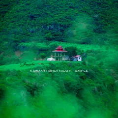 A view of the Kawanti Bhutnaath temple through the mist, surrounded by lush green mountains. This photo showcases the mystical beauty of the Himachali landscape.