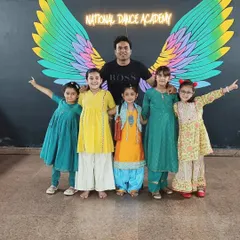 Our instructor Robin with a group of young performers at the Greenfield studio. We are personally involved in the progress and happiness of each child.