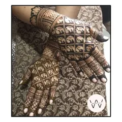 Henna is for everyone in the celebration. This intricate back-hand design, filled with detailed elephant figures and jaal patterns, was created for a special client celebrating Karwachauth.