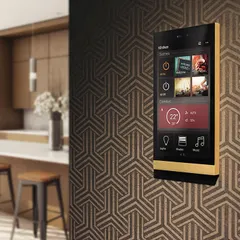 This is the command center of a smart home. A single, elegant touch panel on the wall gives you complete control over scenes, lighting, climate, and music, blending powerful technology with your interior design.