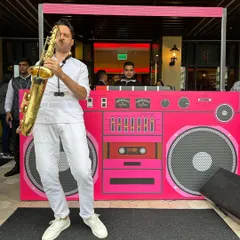 A live jam session with saxophonist Antonio during a brunch event in Vietnam. The smooth sounds of the sax over a groovy beat create an effortlessly cool atmosphere.