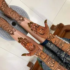 The deep, reddish brown stain on this Radha Krishna portrait design is a sign of high quality, natural henna. This is the color every bride dreams of.