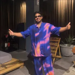 Just living life like it's a movie scene. My personal style is a big part of my vibe, and I love dressing for the occasion, whether I'm on or off stage.