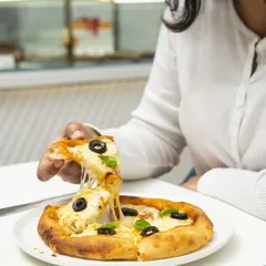 That moment of pure pizza bliss. Grab a slice of our classic margherita and enjoy the simple perfection of tomato, mozzarella, and fresh basil on a sourdough crust.