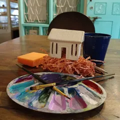 Have you tried Pottery with Puppies? In this unique session, you'll paint a pre-made ceramic house, symbolizing the forever home our shelter pets are looking for.