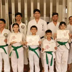 Students who have just earned their green belts at our Virar dojo. This is a testament to their consistent training and focus on improving their karate skills.
