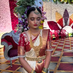 Another angle of Priyanka's wedding day look, showing the smooth, matte-yet-radiant skin finish that is essential for South Indian bridal makeup.