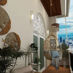 A close-up of the cozy rattan swing chair, perfect for unwinding with a book while enjoying the city view.