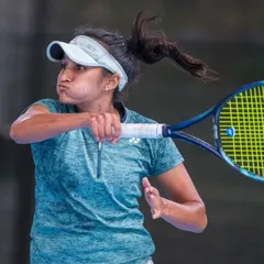 I believe in the process. These photos show me working with my coach on specific techniques and shot placements. This is the kind of detailed, hands-on training I provide.