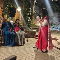 Interacting with panelists and the audience during a discussion. As a moderator, I facilitate meaningful conversations and keep the energy flowing.