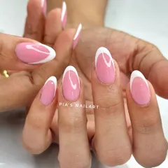 A fun twist on the classic French, using an aqua pink base with the traditional crisp white tip for a pop of color.