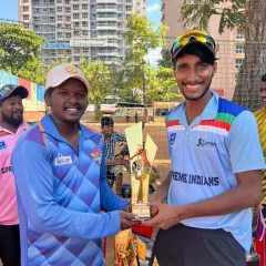 Presenting the award for the Best Batsman to Jeet Pandit. His consistent scoring was crucial for the team throughout the tournament.