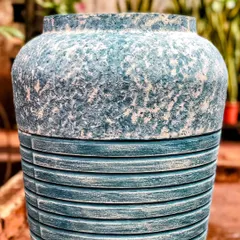 Yes, we sell pots! This concrete beauty with a distressed blue finish is just one example of the unique planters you can find at our studio or through our brand, Terrapotta.