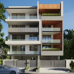 This residential facade design balances open and solid elements, using a combination of white plaster, a fluted grey panel, and warm wood cladding. The strategic placement of balconies and planter boxes ensures that each level has a connection to the outdoors.