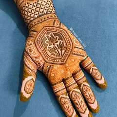 A modern take on a traditional design, with a central lotus motif. The geometric patterns and clean lines make this a very elegant choice for festivals or parties, offering a look that is both classic and contemporary.