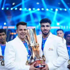 Standing with a champion. A proud moment holding the PKL trophy with one of our key players, showcasing the success that comes from dedication and a scientific approach to training.
