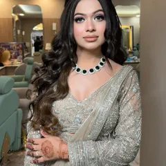 A full view of this stunning engagement look. The soft glam makeup is paired with beautiful, voluminous curls, creating a look that is both modern and timeless.